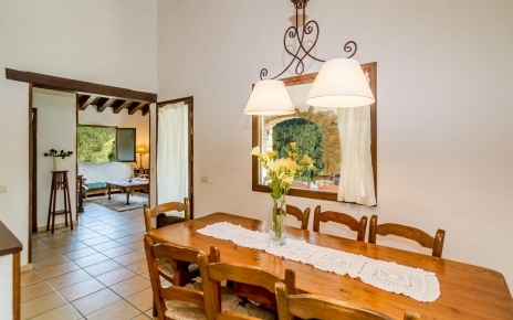 Dining room with doors to furnished terrace